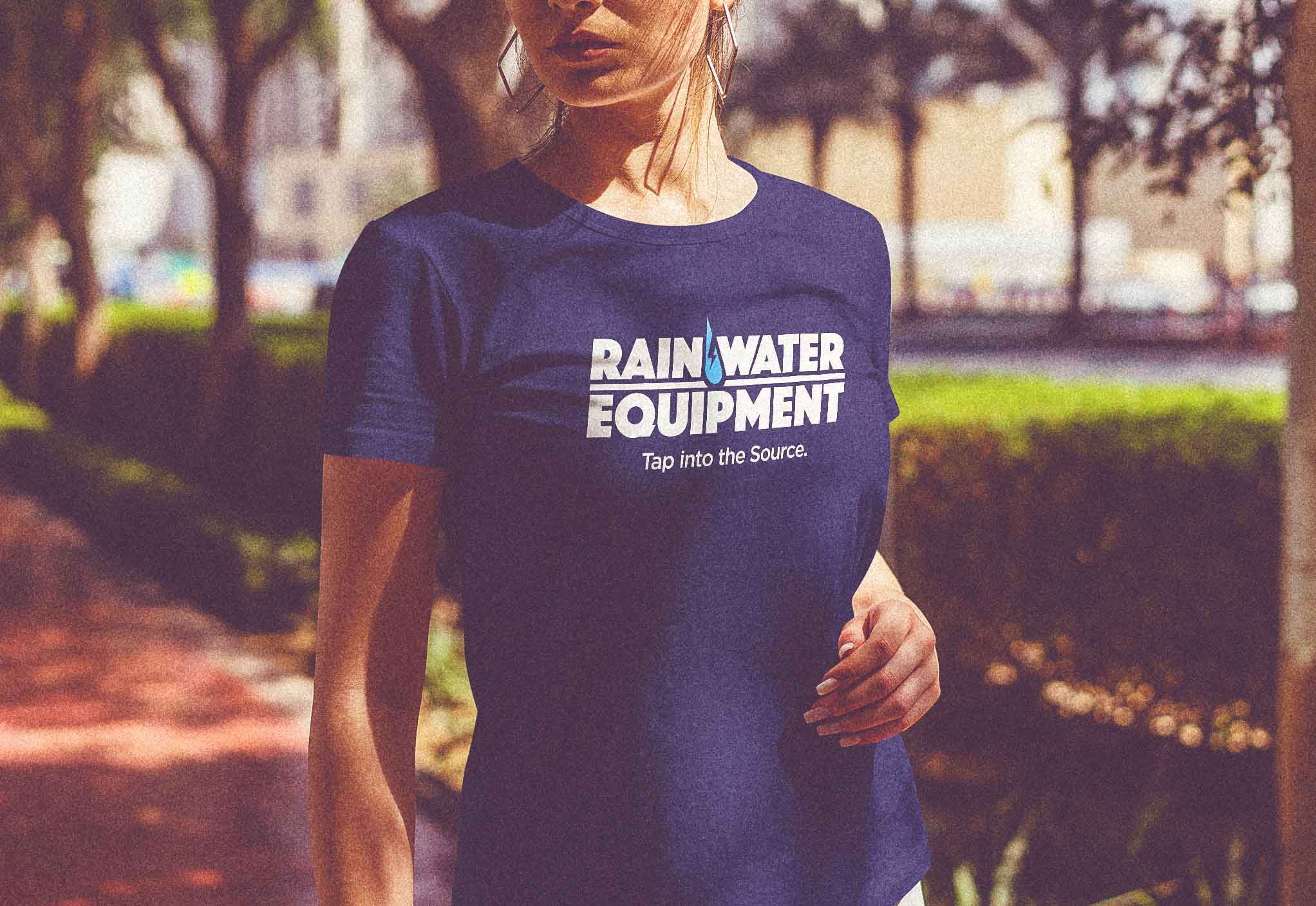 Woman wearing a Rainwater Equipment Tshirt with Logo