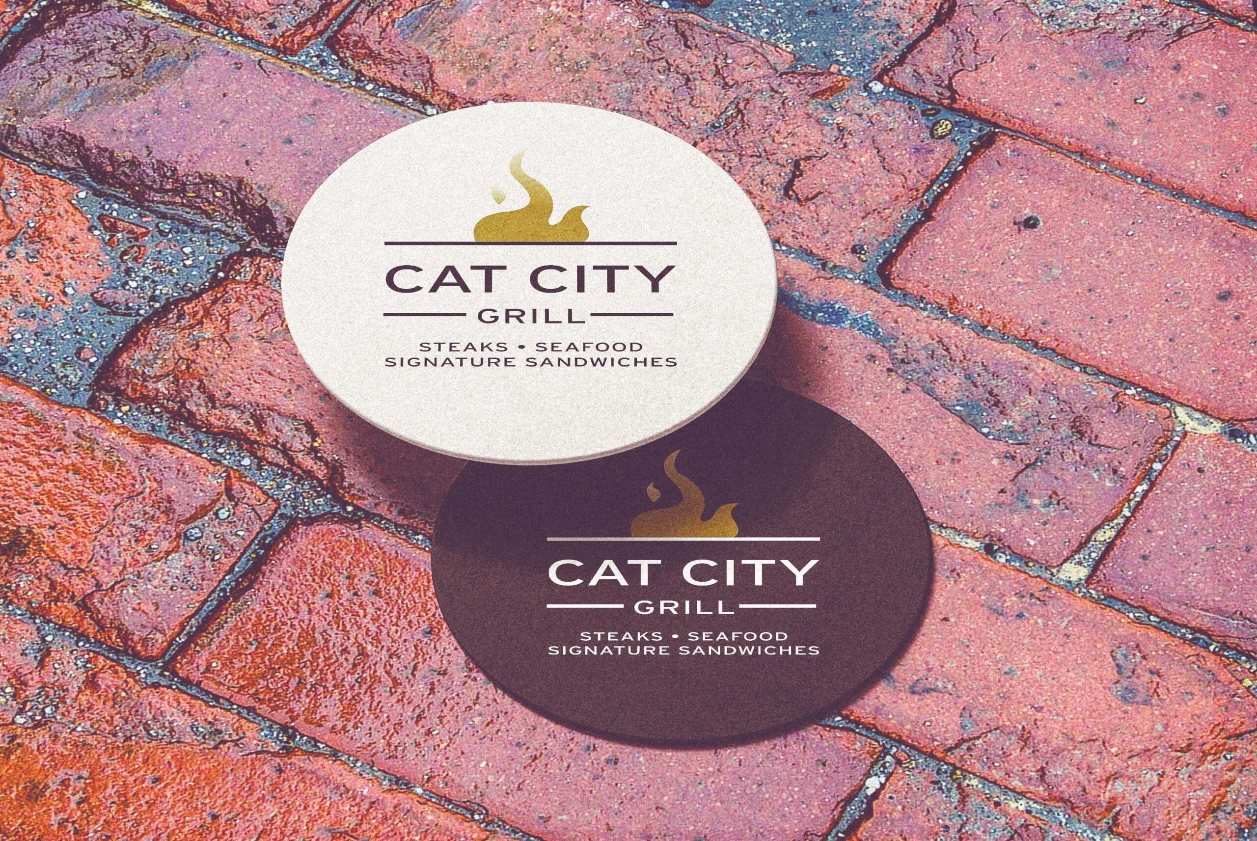 Cat City Grill logo on coaster