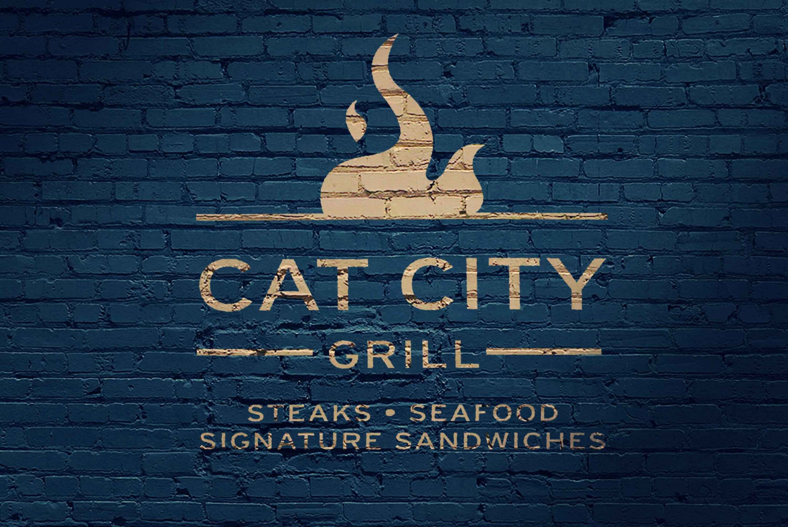 Cat City logo on brick wall