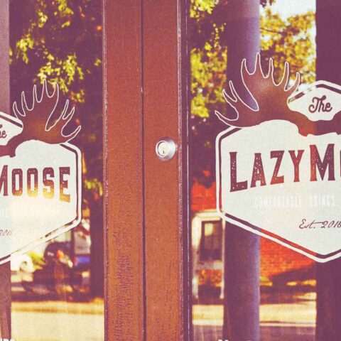 Lazy Moose front doors with logo