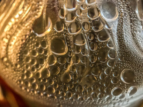 A macro photo of a bottle.